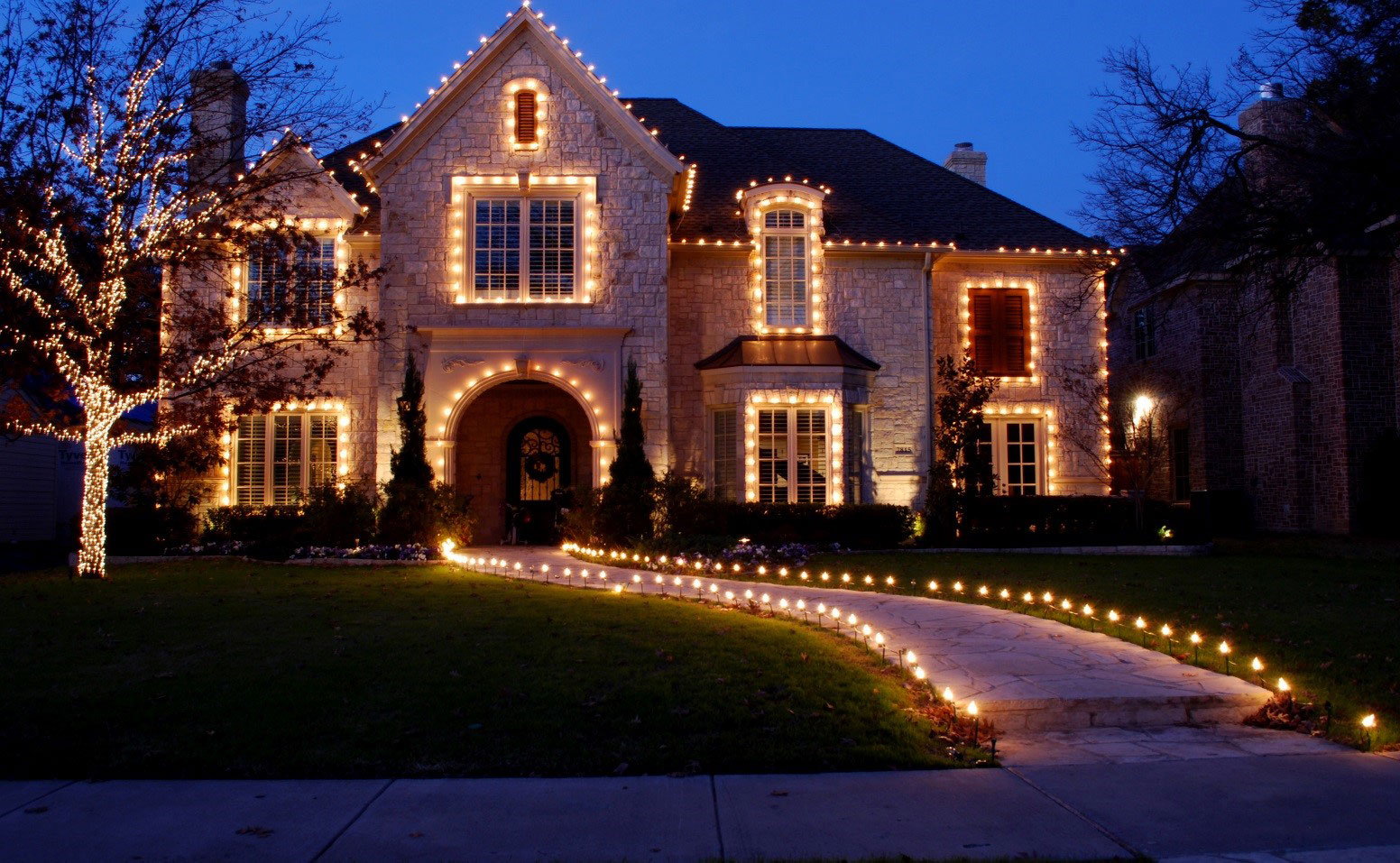 Beautifully decorated home with Christmas lights